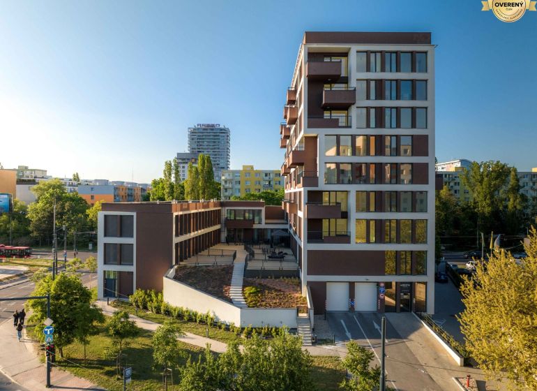 Construction of apartments on Mierová Street in Bratislava - Ružinov, with surrounding greenery.