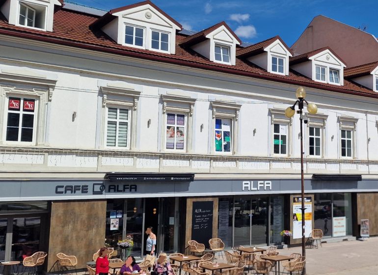 A building with a café and terrace on Sv. Egídia Square in Poprad, offices on the upper floor.