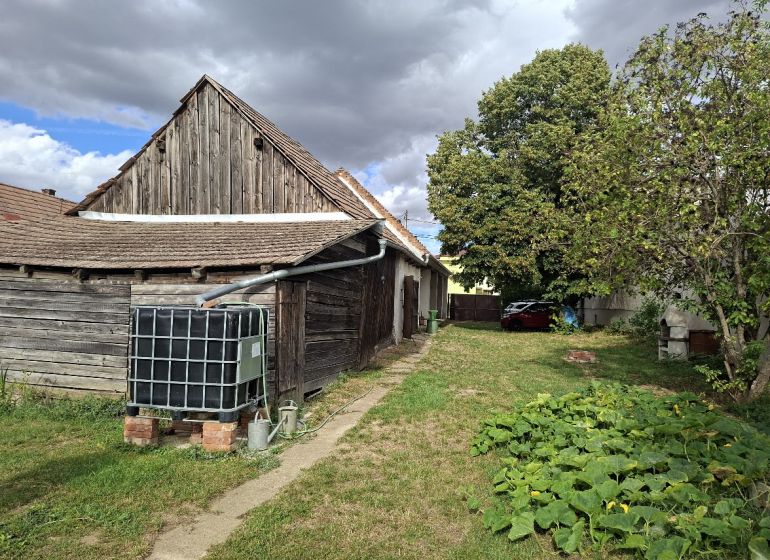 Garden by the wooden house on Hlavná Street in Viničné, Land - residential.