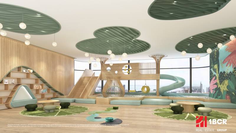 Children's playroom with a wooden decor floor, slide, and creative ceiling. Apartment construction.