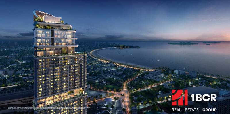 Night panorama of apartment construction in the city of Chon Buri 20150 with a view of the coastline.
