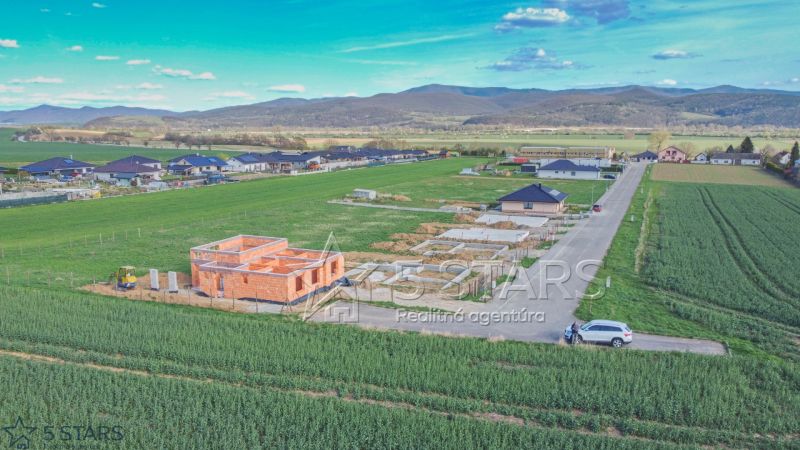 Construction of a family house in Trenčín amidst green nature and open countryside.