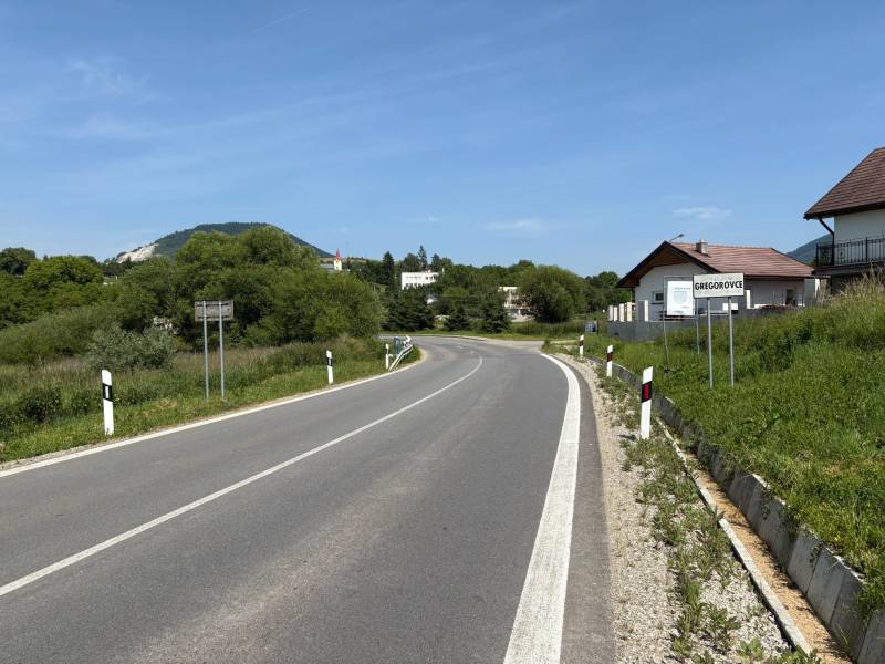 A road leading through the village of Gregorovce, suitable for residential plots, surrounded by nature.
