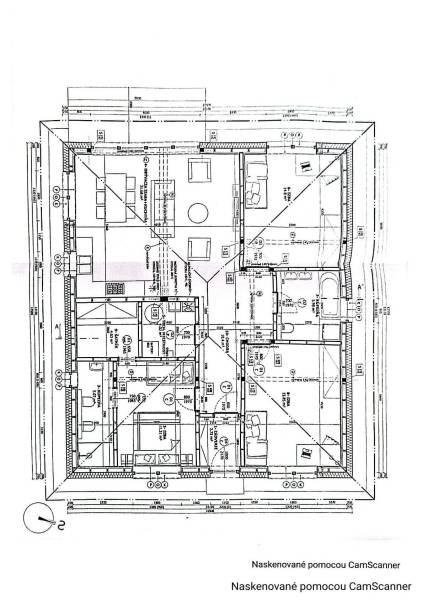A black and white floor plan of a house with four rooms, a kitchen, and amenities, suitable for residential plots.