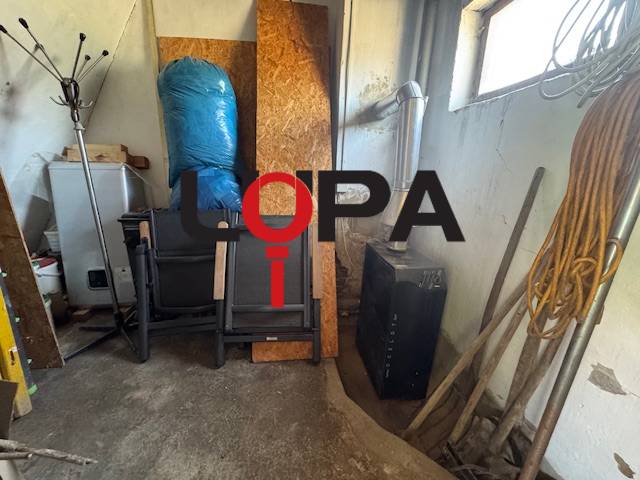 Storage spaces in a family house, equipped with various tools and supplies.