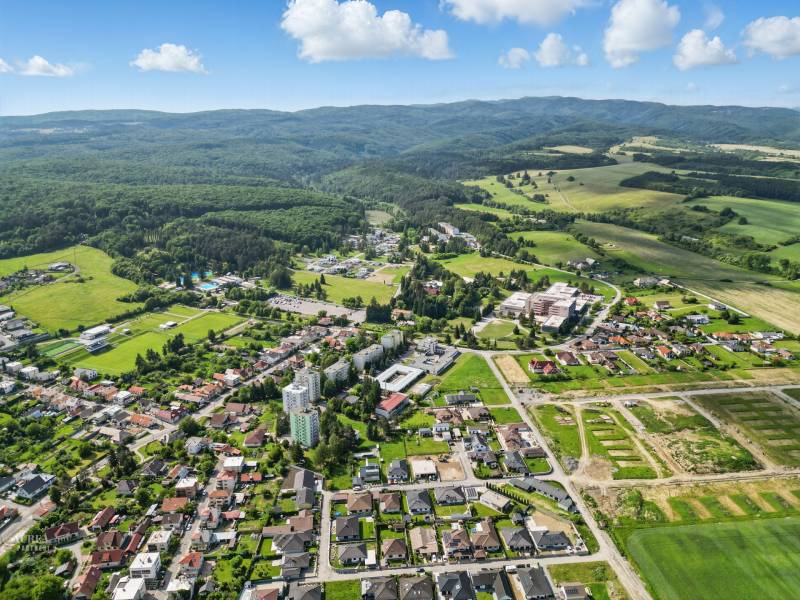 Aerial view of Kováčová, plots - residential area near Slnečná Street, surrounded by nature.
