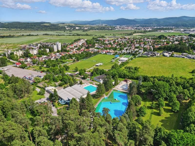 View of the swimming pool and surroundings in the Kováčová area on Slnečná Street. Plots - residential.