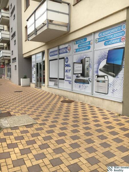 Commercial premises on Štúrova Street in Senec with entrance and advertising display windows.