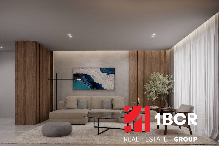 A comfortable living room of a 3-room apartment with a brown wall, sofa, painting, and table.