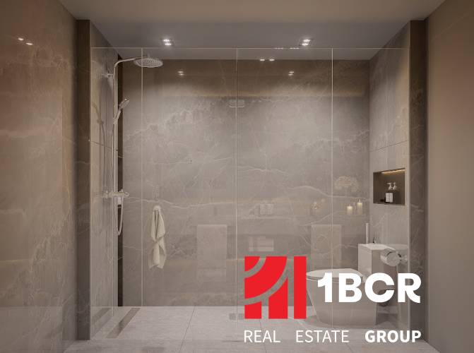 Luxury bathroom in a 3-room apartment with a shower and toilet.