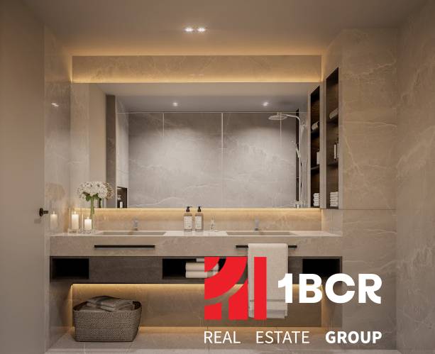 Elegant bathroom in a 3-room apartment with a double sink, candles, and decorative lighting.