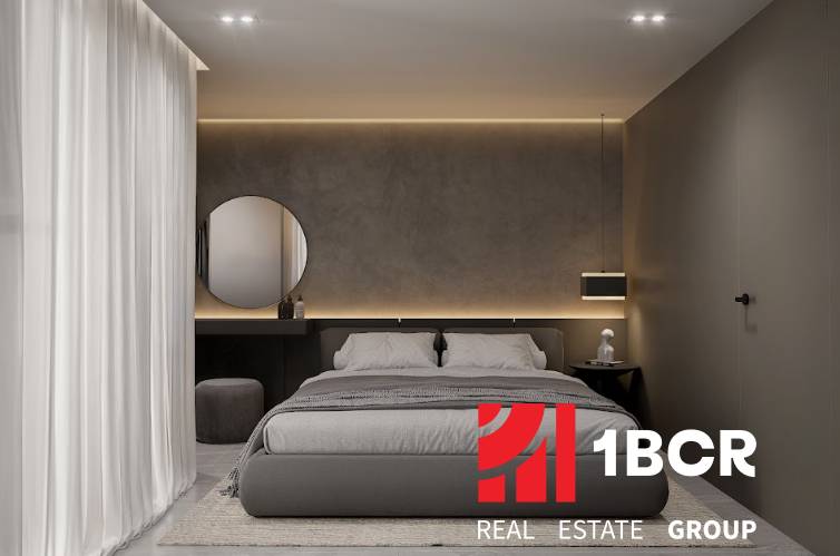 Stylish bedroom with a double bed and decorative lighting in a 3-room apartment.