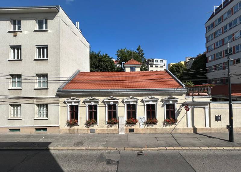 House on Cintorínska Street in Bratislava - Old Town with a red roof.