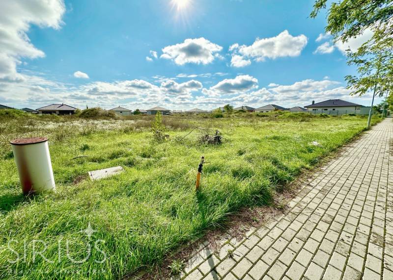 Plots at Južná Brána in Senec, suitable for living, surrounded by family houses.