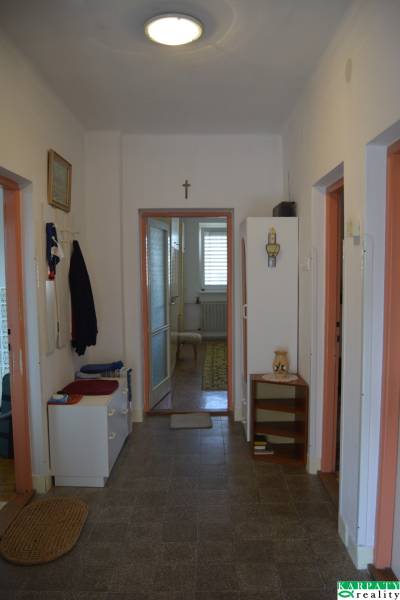 Entrance hall in a family house with furniture and decorations.