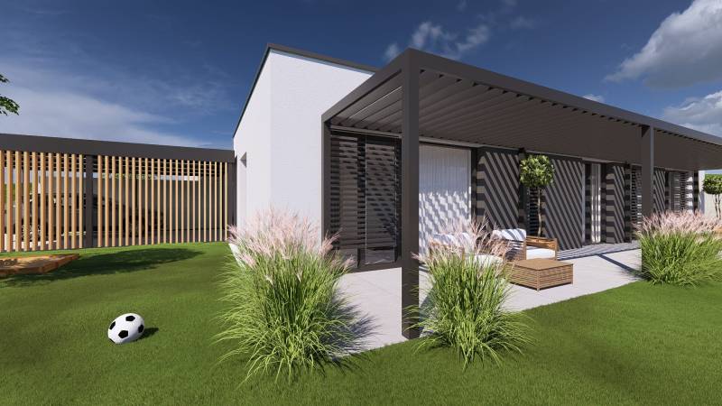 A family house in Gaboltov with a pergola, lawn, and a soccer ball in the garden.