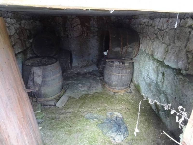 An old cellar space of a family house with barrels in Telkibanya.