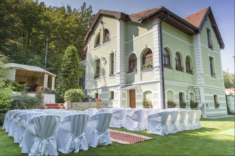 The exterior of the guesthouse Košice - North with a furnished garden, ready for events.
