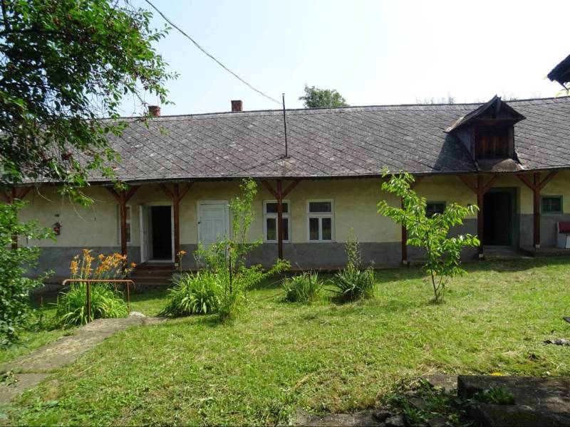 A family house in Tornaszentandrás with a large garden and one attic window.