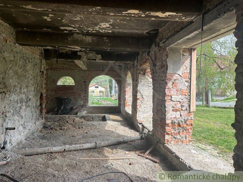Reconstruction of a family house with brick walls and arched windows in Rimavská Sobota.