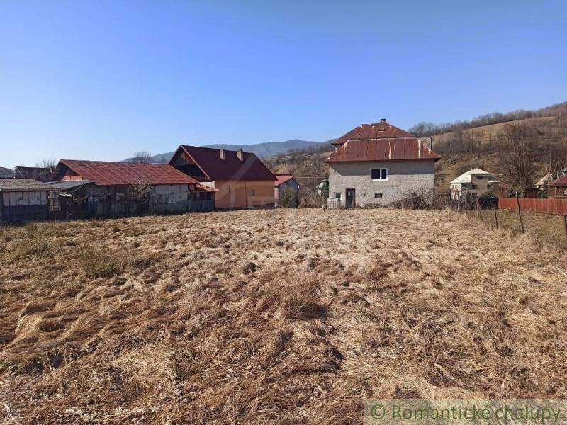 A family house in Nová Sedlica with a grassy plot and surrounding countryside.