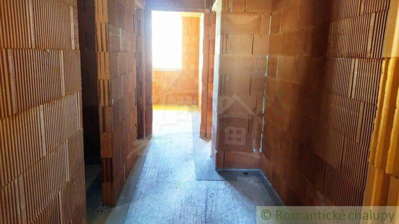 Building, interior with brick walls and flooring in a family house.