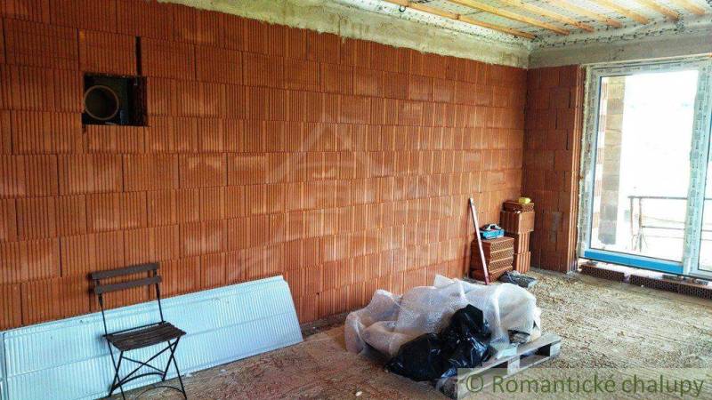 Interior construction, bricks, plastic chairs, family house, empty room, windows, renovation.