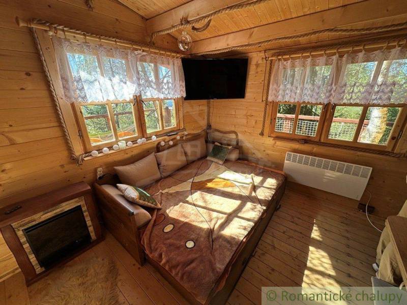 Cozy interior with wooden decor and a television in a family house.