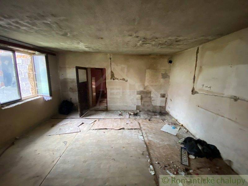 Empty room and family house with damaged walls and floors during renovation.