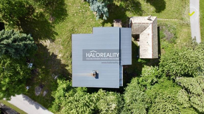 Aerial view of a family house in Nová Baňa surrounded by greenery and nature.