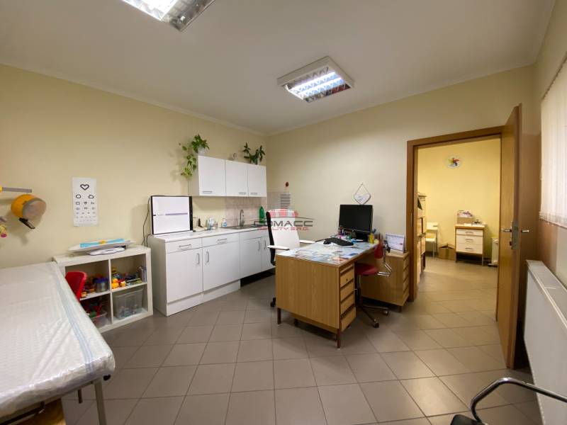 On Nitrianska Street, there are offices with wooden furniture and equipment for children.