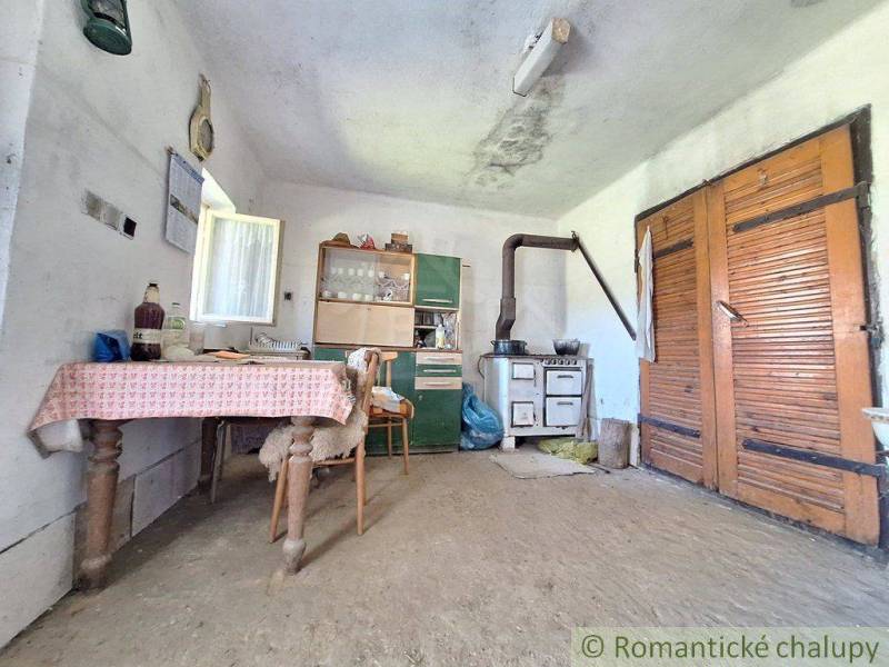A country kitchen with antique furniture and a stove, Unique properties.