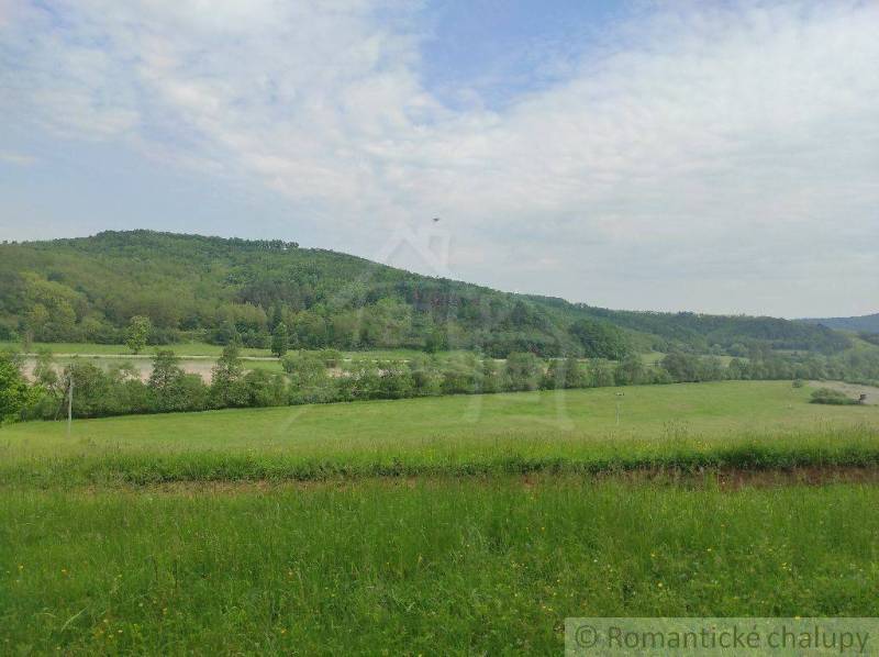 Green meadow, hills, and forests characterize the picturesque landscape of the Family House.