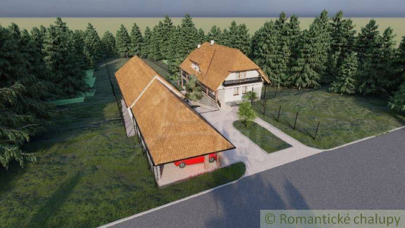 A rural estate surrounded by trees, consisting of two buildings and a forested background.
