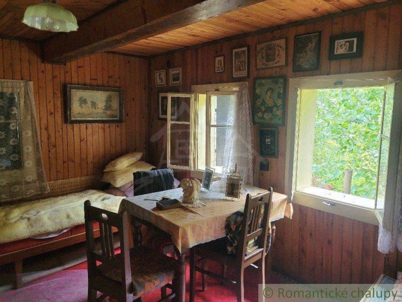 A picturesque room in a rustic style, a family house with wooden furniture.