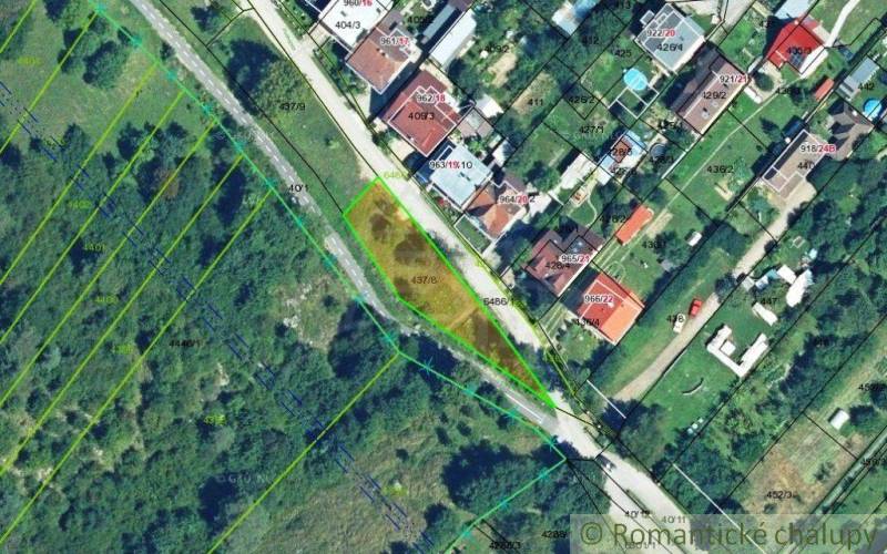An aerial map shows divided plots and housing in a suburban area with vegetation.
