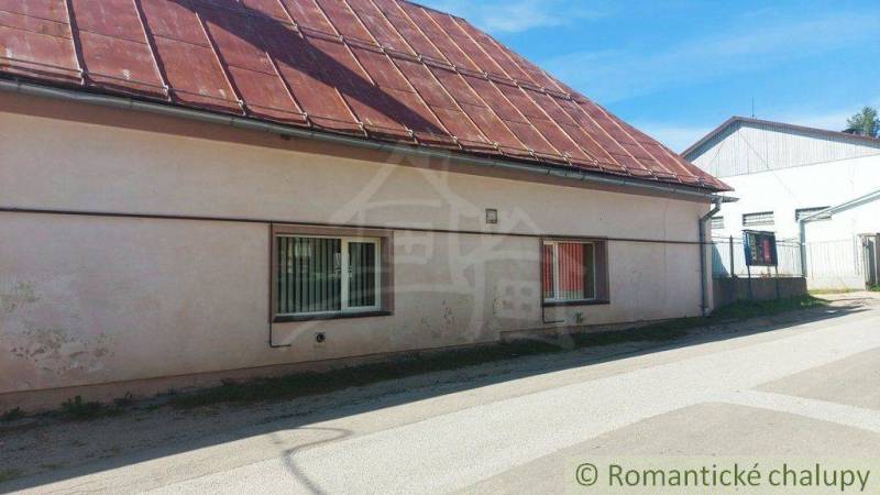 A family house in a quiet location with a sloped roof and simple facade.