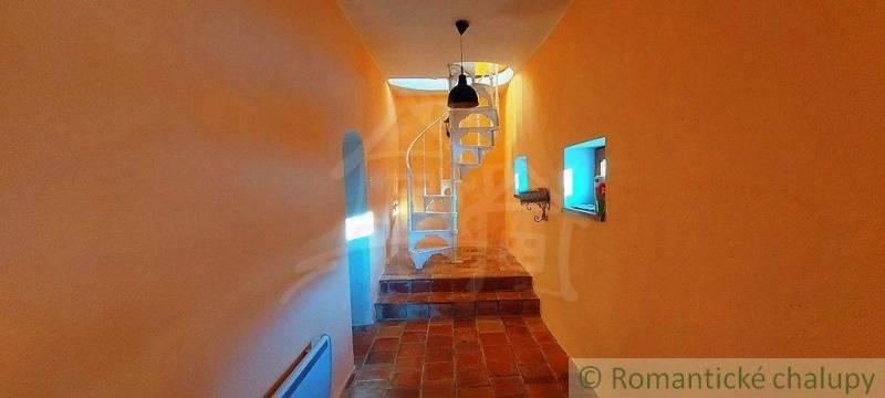 Brick floor, spiral staircase, and unique properties create unique architectural features.