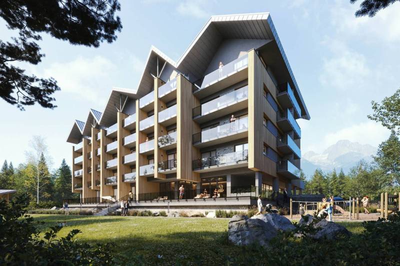 Exterior of a Holiday Apartment in Štôla surrounded by nature and mountains.