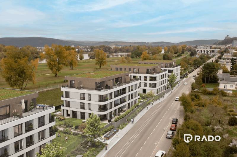 New apartment buildings on Karpatská Street in Trenčín, with a view of nature and greenery.