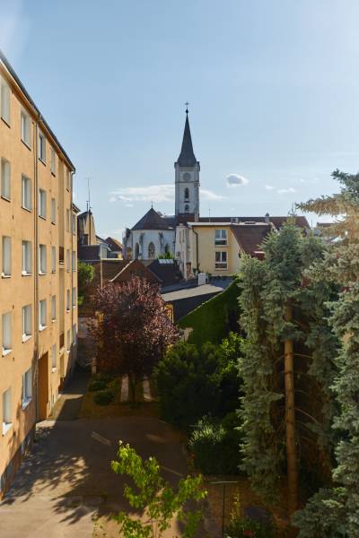 Vodná Street in Košice, Old Town district with a view of the church.
