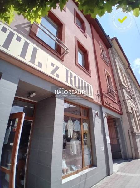 Commercial premises in Brezno with a stylish display window, brick facade, glass doors.