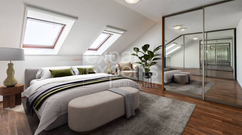 A bright attic bedroom with a large mirrored wardrobe in a 4-room apartment.