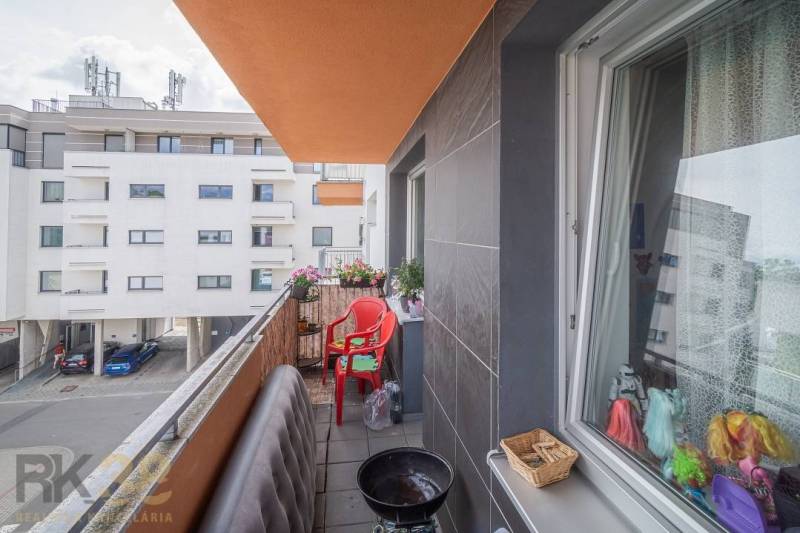 Underground garage in a 3-room apartment offering spacious parking spaces and secure storage.