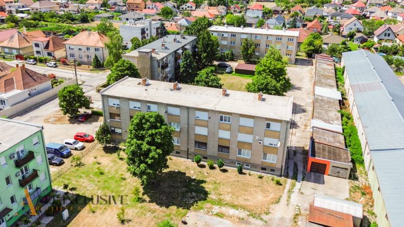 Aerial view of residential buildings and surroundings in Gabčíkovo, suitable for a 2-room apartment.
