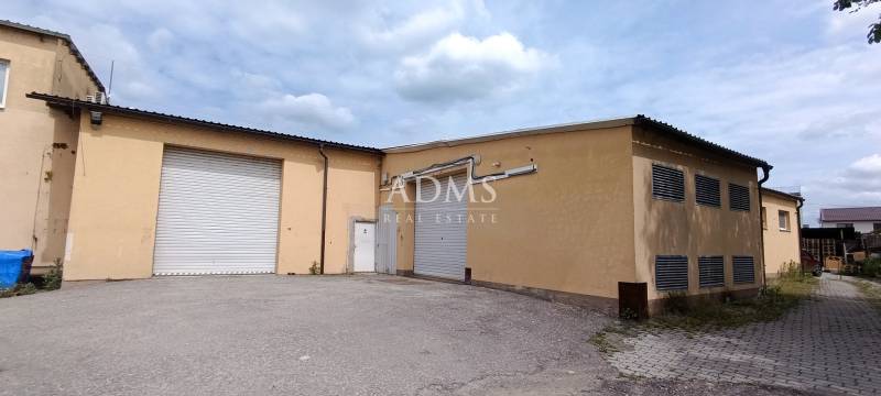 Warehouses and halls on Kpt. Nálepku Street in Ilava with industrial garage doors.