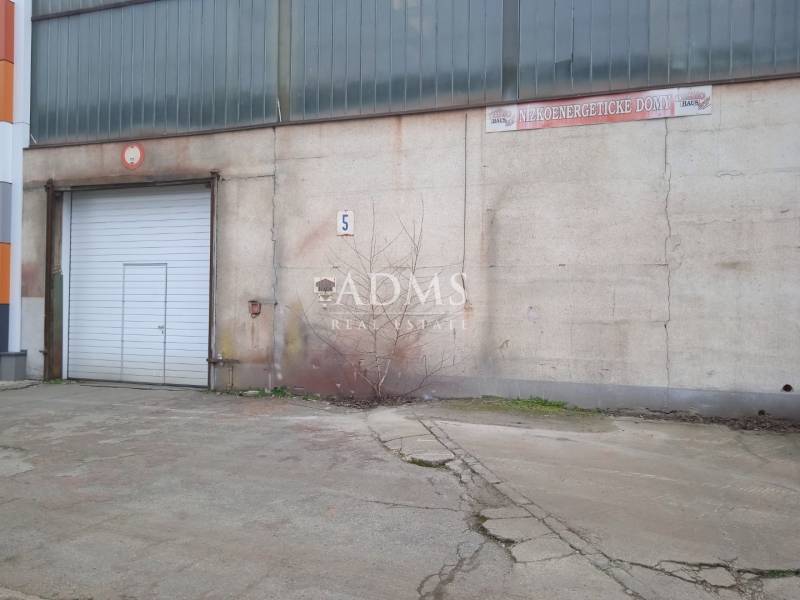 Old building and warehouse with industrial doors in Nové Mesto nad Váhom.