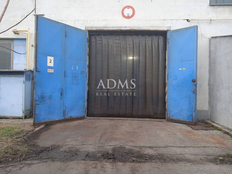 Open blue gates of the warehouse and hall in Nové Mesto nad Váhom.