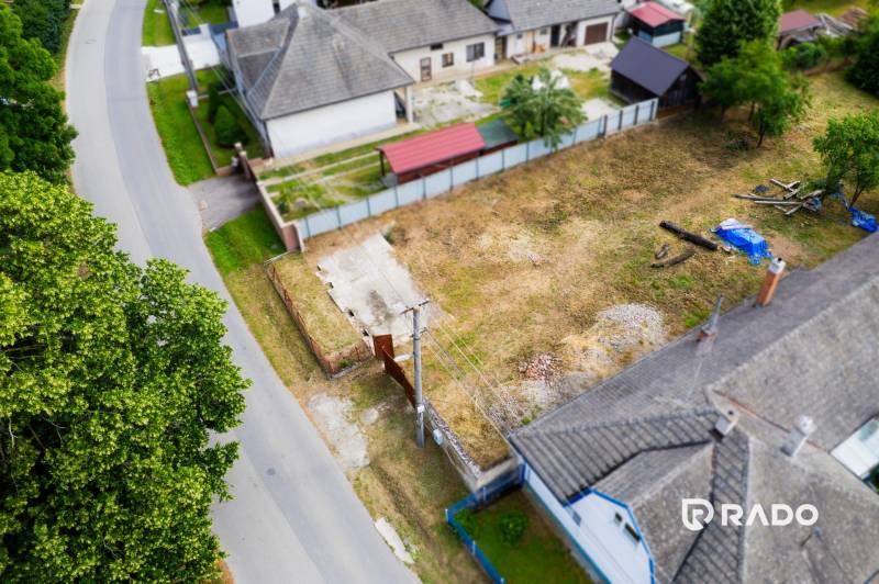 Plots - residential in Chocholná-Velčice, next to the road, adjacent to family houses and gardens.