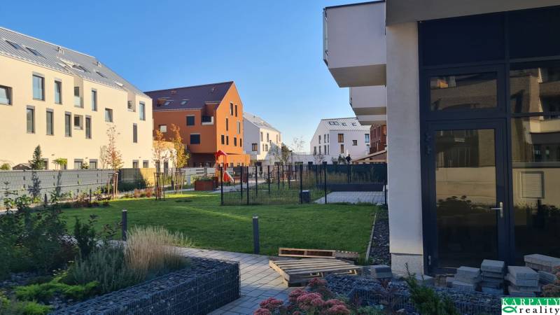 The courtyard of the residential complex on Perlová Street in Bratislava - Jarovce with a children's playground.